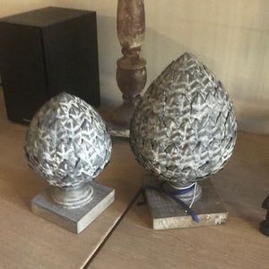 Two decorative finials